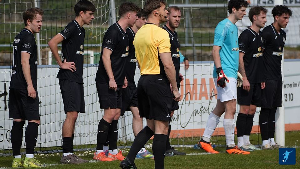 11 Mann auf der Linie