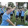 So feiern Siegerinnen ihren Pokalerfolg: Die Fußballerinnen des SC Wißkirchen rissen nach dem 2:0-Sieg über den SC Dirmerzheim die Arme hoch und tanzten auf dem Platz.