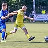 Immer einen Schritt voraus sind Nick Pio Murana (gelbes Trikot) und der FV Budenheim beim 5:0-Heimsieg gegen die SG Harxheim/Gau-Bischofsheim (mit Robin Mohm). 	