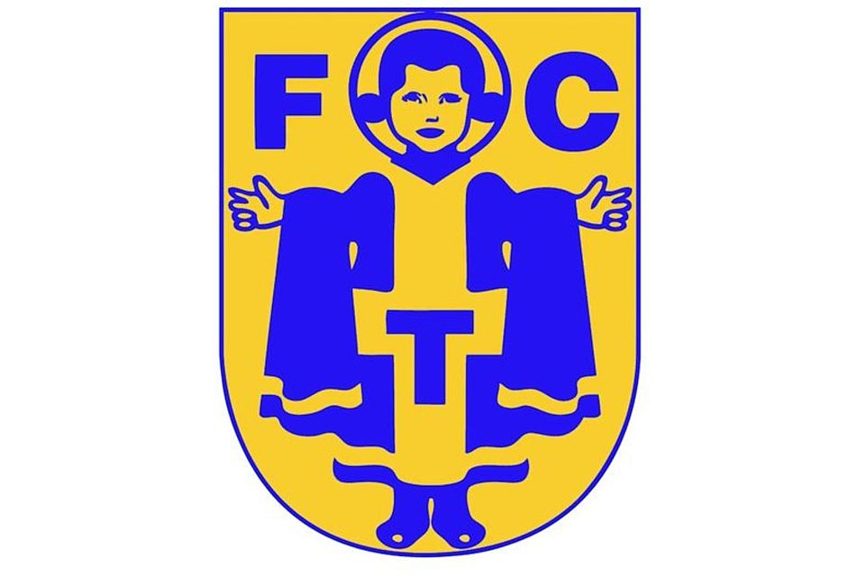 Das Logo des FC Teutonia München erstrahlt in Blau und Gelb.