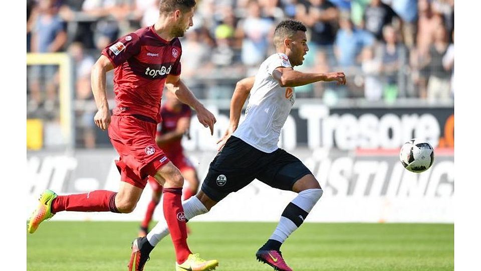 Ex-Profi Andrew Wooten (rechts), hier vor acht Jahren für den SV Sandhausen gegen FCK-Innenverteidiger Stipe Vucur am Ball, kommt mit Mechtersheim nach Bretzenheim.	Archivfoto: dpa