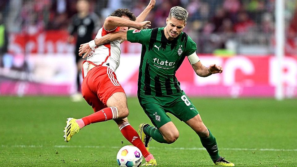 Der Fußballspieler Thomas Müller und Julian Weigl