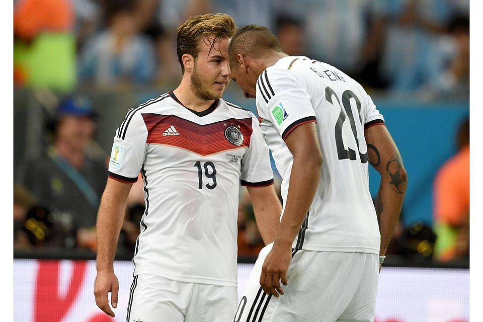 Marcus Brandt (dpa) Mario Goetze (L) of Germany celebrates with teammate Jerome Boateng after scoring 1-0 goal during the FIFA World Cup 2014 final soccer match between Germany and Argentina at the Estadio do Maracana in Rio de Janeiro, Brazil, 13 July 2014. Photo: Marcus Brandt/dpa (RESTRICTIONS APPLY: Editorial Use Only, not used in association with any commercial entity - Images must not be use