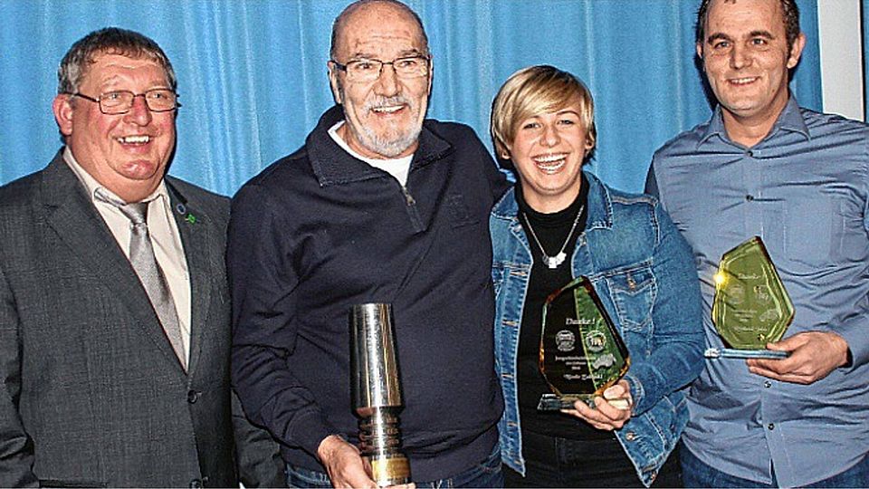 Gruppenbild mit Dame: Reinhold Lange, Reinhold John, Nicole Zabinski und Nicki Bornholdt (von links).