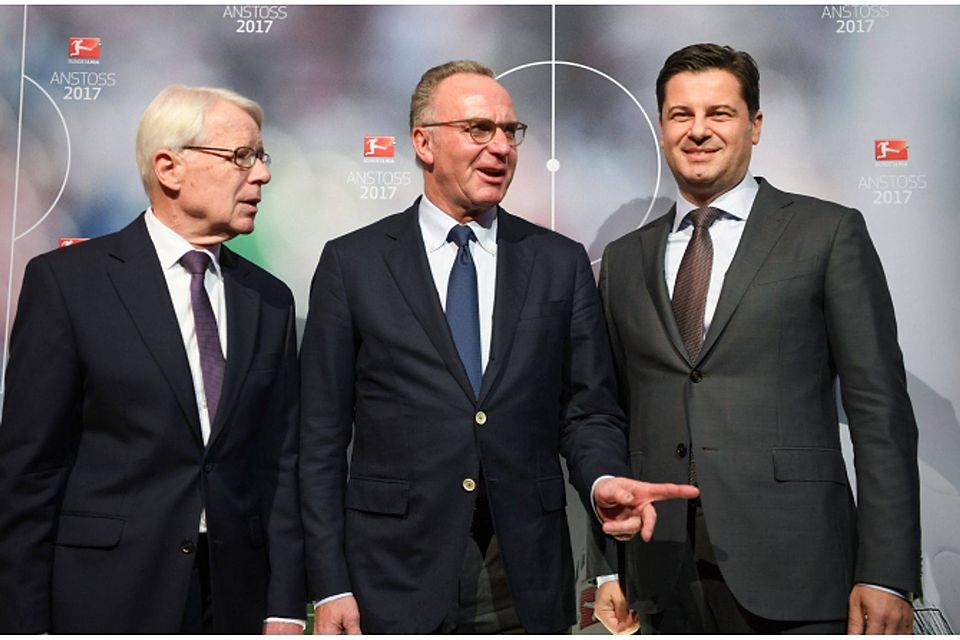 Spitze der DFL: Präsident Reinhard Rauball, Bayern-Boss Karl-Heinz Rummenigge und Bundesliga-Geschäftsführer Christian Seifert. picture alliance / Arne Dedert/d / Arne Dedert