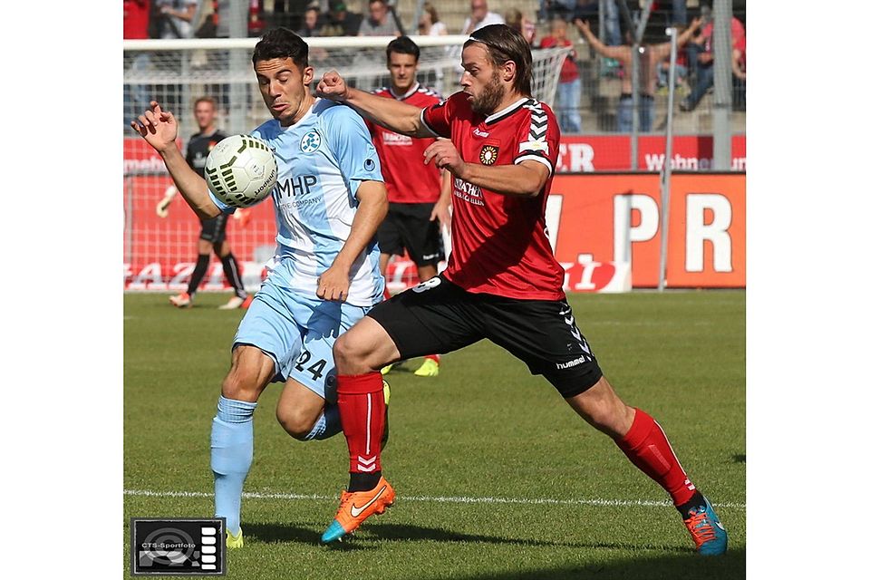 Harter Kampf zwischen Edisson Jordanov (Kickers) und Torschütze und Pechvogel Timo Röttger (Großaspach) Foto:CTS-Sportfoto Harter Kampf zwischen Edisson Jordanov (Kickers) und Torschütze und Pechvogel Timo Röttger (Großaspach) Foto:CTS-Sportfoto