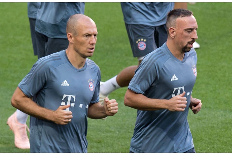 Arjen Robben (l.) und Franck Ribéry. dpa / Sven Hoppe