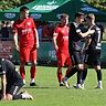 Die Situation nach dem Derby: Burghausen (schwarze Trikots) wie nach einer Niederlage.