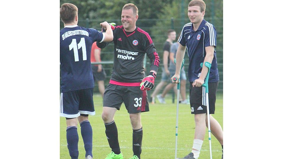 Spieler des Abends: A/O-Torwart Andreas Bockelmann (Mitte)