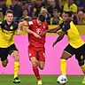 Der FC Bayern München und Borussia Dortmund planen wegen der Corona-Krise eine Millionen-Spende. dpa / Marius Becker