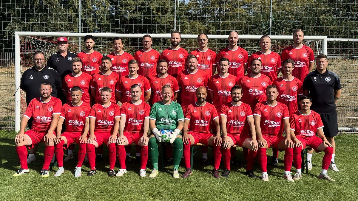Fußballer als Team auf dem Spielfeld